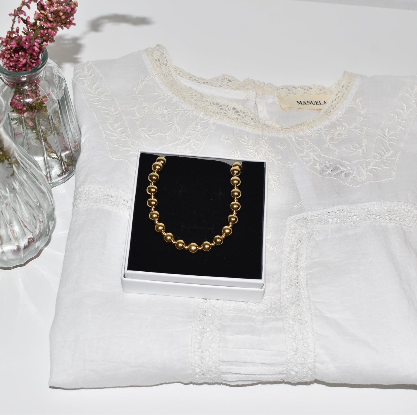 PACK BLUSA BOUQUET + COLGANTE MASACCIO