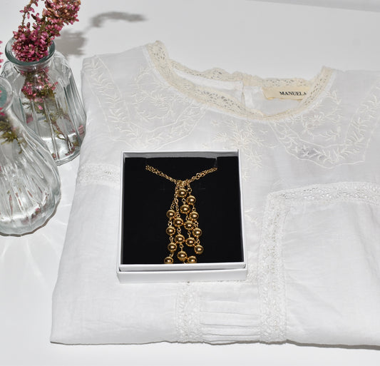 PACK BLUSA BOUQUET + COLGANTE MADONNA