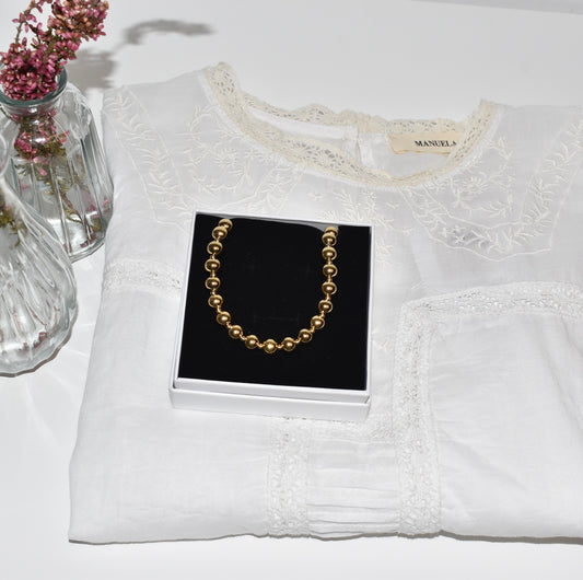 PACK BLUSA BOUQUET + COLGANTE MASACCIO